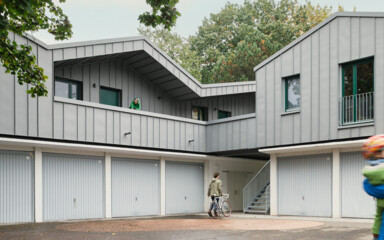 Startseite > Immobilien > News > Wohnen auf Garagendächern: Wie Städte neuen Wohnraum erschließen wollen Garagenaufstockung im Quartier der Volkswohnung